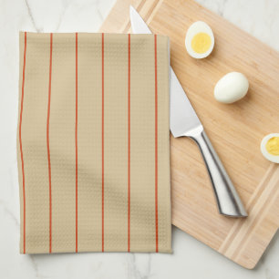 Serviettes rouille sur la cuisine beige