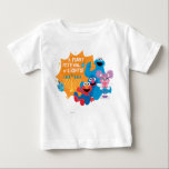 Sesame Street | A Furry Festival of Lights! Baby T-Shirt<br><div class="desc">Celebrate Hanukkah with your favourite Sesame Street friends in this delightful “A Furry Festival of Lights!” design! Featuring Cookie Monster, Elmo, Grover, and Abby Cadabby, this festive illustration captures the joy and warmth of the holiday season. Surrounded by a glowing menorah, playful dreidels, and cheerful smiles, this design is perfect...</div>
