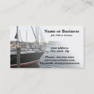 several sail boats docked business card