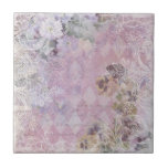 Shabby Vintage Floral Tile<br><div class="desc">Pretty design in a lightly distressed shabby collage style featuring lace mesh, pansies and asst. flowers, and an off-white engraved scroll border on a harlequin diamond background with subtle antique handwritten text in shades of lilac, rose and grey.</div>