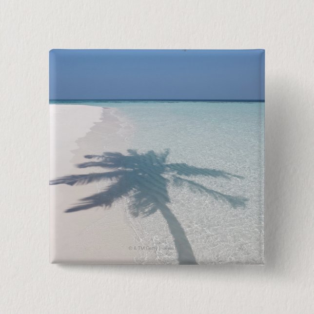 Shadow of a palm tree on a deserted island beach 2 inch square button (Front)