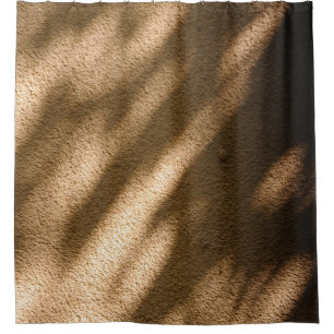 Shadow on brown carpeted floor