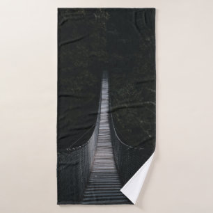 SHALLOW FOCUS PHOTO OF BROWN WOODEN BRIDGE BATH TOWEL