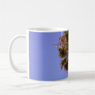 Shallow focus photo of green tree coffee mug