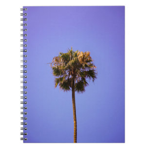 Shallow focus photo of green tree notebook
