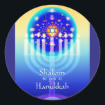 Shalom at Hanukkah Menorah Lights & Star of David. Classic Round Sticker<br><div class="desc">A Hanukkah menorah shines against a background of yellow, turquoise and blue with a circle that resembles a kaleidoscope or a stained glass window. The Star of David glows at the apex of the central candle (also called the Shamash or "servant" candle) which is the first candle lit and which...</div>