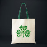 Shamrock Skulls Tote Bag<br><div class="desc">Green Irish shamrock skulls t-shirts and gifts. What could be possibly be more awesome than a plain old classic shamrock on St. Patrick's Day? Why, our cool shamrock skulls t-shirts, accessories and gifts! Multiple skulls and crossbones are arranged into the shape of an Irish Shamrock. Everyone wants to find the...</div>