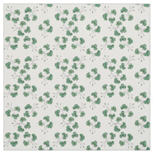 Shamrocks assez verts sur le tissu blanc de motif