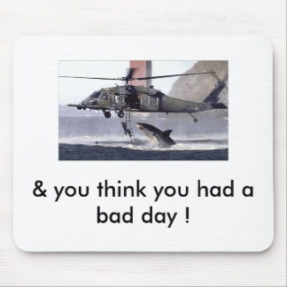 Shark attacks helicopter. mouse pad