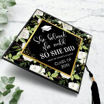 She Believed She Could Floral Graduation Cap Topper<br><div class="desc">Elegant graduation cap topper featuring a trendy black background,  cute white florals with green foliage,  gold glitter,  the saying "she believed she could so she did",  the school/college name,  and class year.</div>