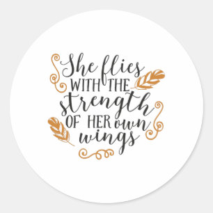 She flies with the strength of her own wings classic round sticker