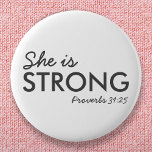She is Strong | Proverbs 31:25 Christian Faith 2 Inch Round Button<br><div class="desc">Simple,  stylish christian scripture quote art design with bible verse "She is Strong - Proverbs 31:25" in modern minimalist typography in off black. This trendy,  modern faith design is the perfect gift and fashion statement. | #christian #religion #scripture #faith #bible #jesus #bethelight</div>