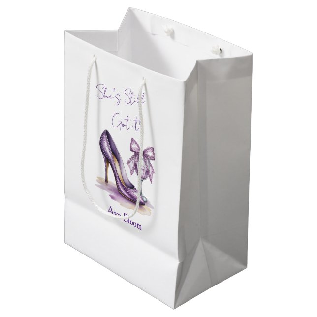 She’s Still Got It Purple High Heel Birthday Party Medium Gift Bag (Front Angled)