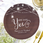 She Said Yes Rustic Engagement Party Paper Plate<br><div class="desc">Rustic chic engagement party paper plate. Easy to personalize with your details. Please get in touch with me via chat if you have questions about the artwork or need customization. PLEASE NOTE: For assistance on orders,  shipping,  product information,  etc.,  contact Zazzle Customer Care directly https://help.zazzle.com/hc/en-us/articles/221463567-How-Do-I-Contact-Zazzle-Customer-Support-.</div>