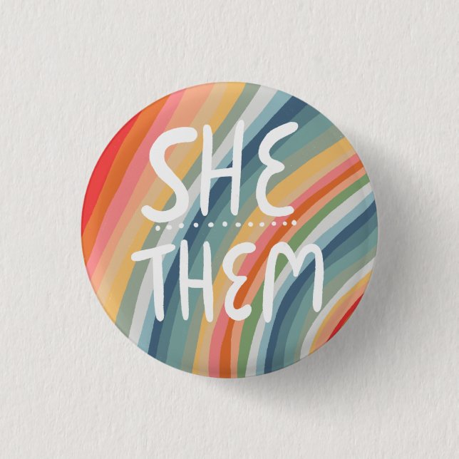 SHE/THEM Pronouns Colourful Handlettered Rainbow 1 Inch Round Button (Front)