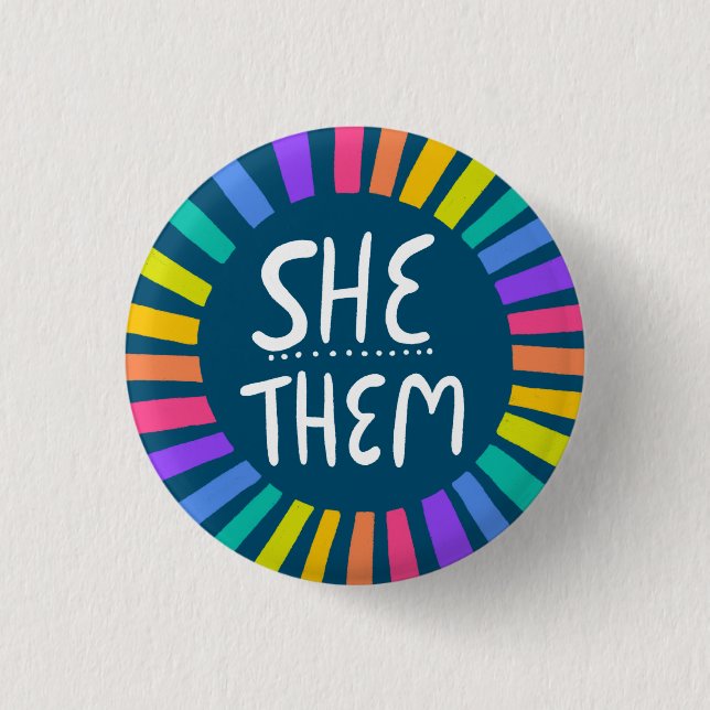 SHE / THEM Pronouns Rainbow Handlettered Pride 1 Inch Round Button (Front)