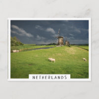 Sheep with windmills under dark clouds