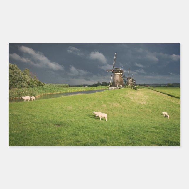 Sheep with windmills under dark clouds sticker (Front)