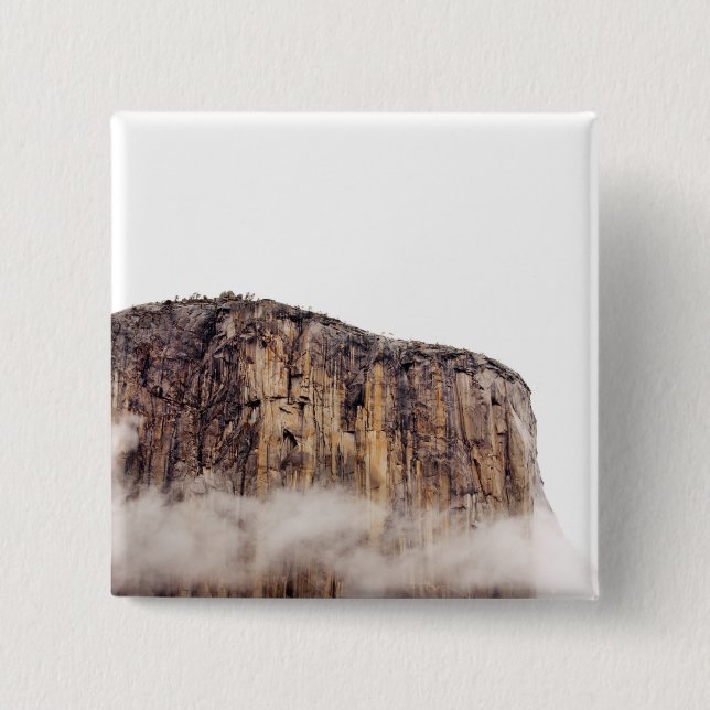 Sheer cliff rising above clouds 2 inch square button (Front)