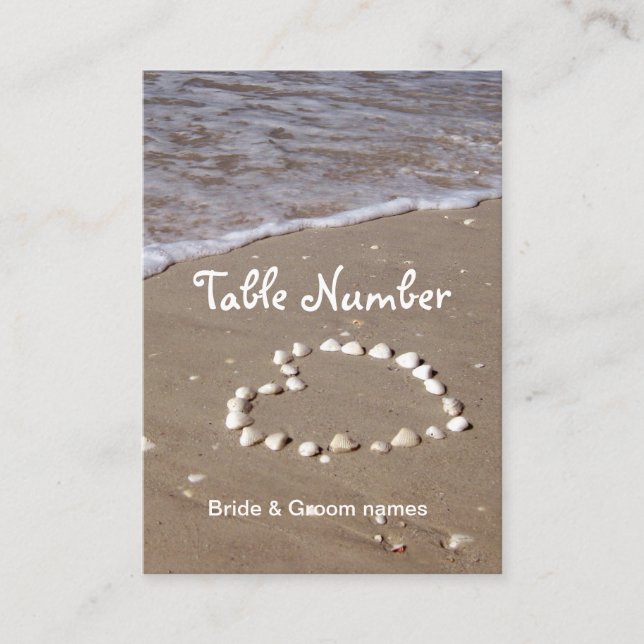 Shell heart on sandy beach reception place cards (Front)