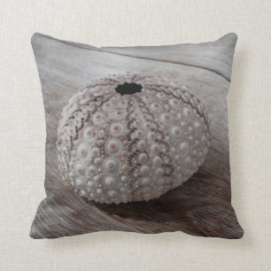 Shell On Top Of A Wooden Table Throw Pillow