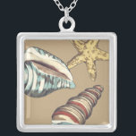 Shell Trio on Khaki Silver Plated Necklace<br><div class="desc">Megan Meagher is known for her simple art pieces. This is a great image of decorative art capturing the sea life with a yellow starfish and a blue and red conch shell. Get this fine art print today on Khaki colour on your Zazzle product.</div>