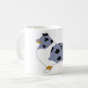 shetland sheepdog blue merle white and tan silo.pn coffee mug