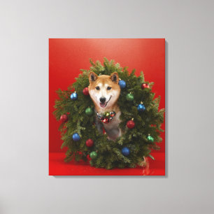 Shiba Inu dog sitting in Christmas wreath Canvas Print
