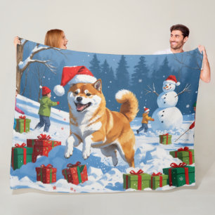 Shiba Inu Running in Snow with Christmas Hat Fleece Blanket