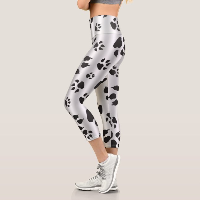 Shimmering Silver and Black Dog Paw Prints Capri Leggings (Left)