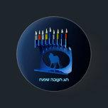 Shiny Blue Chanukkah Menorah 2 Inch Round Button<br><div class="desc">A modernistic,  metallic,  blue Chanukkah menorah,  featuring a lion in silhouette,  against a dark,  night-like background. All nine of the candles are lit. Hebrew text reading "Chag Chanukkah Sameach" (Happy Hanukkah) also appears in glowing blue and white.</div>