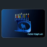 Shiny Blue Chanukkah Menorah Magnet<br><div class="desc">A modernistic, metallic, blue Chanukkah menorah, featuring a lion in silhouette, against a dark, night-like background. All nine of the candles are lit. Hebrew text reading "Chag Chanukkah Sameach" (Happy Hanukkah) also appears in glowing blue and white.</div>