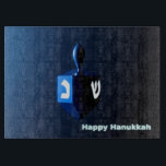 Shiny Blue Dreidel Cutting Board<br><div class="desc">A modernistic, metallic blue dreidel against a dark, night-like background. Two of the Hebrew letters found on a dreidel, nun and shin, glow brightly. Text reading "Happy Hanukkah" also appears in glowing blue and white.</div>