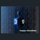 Shiny Blue Dreidel Cutting Board<br><div class="desc">A modernistic, metallic blue dreidel against a dark, night-like background. Two of the Hebrew letters found on a dreidel, nun and shin, glow brightly. Text reading "Happy Hanukkah" also appears in glowing blue and white.</div>