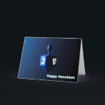 Shiny Blue Dreidel Holiday Card<br><div class="desc">A modernistic,  metallic,  blue dreidel against a dark,  night-like background.  Two of the Hebrew letters found on a dreidel,  nun and shin,  glow brightly.  Text reading "Happy Hanukkah" also appears in glowing blue and white.</div>