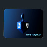 Shiny Blue Dreidel Magnet<br><div class="desc">A modernistic, metallic blue dreidel against a dark, night-like background. Two of the Hebrew letters found on a dreidel, nun and shin, glow brightly. Hebrew text reading "Chag Chanukkah Sameach" (Happy Hanukkah) also appears in glowing blue and white.</div>