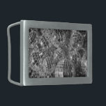 Shiny Disco Ball Ornaments Black and White Photo Rectangular Belt Buckle<br><div class="desc">Disco ball ornaments of various sizes form a chaotic pile in this unique black and white photograph. The shiny mirror balls reflect bright light or dark shadows from each of their small mirrored facets. The glitter ball ornaments rest on top of garlands with reflective silver dodecahedron beads. Digital, black &...</div>