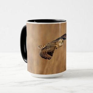 Short-eared owl in flight at the grasslands mug