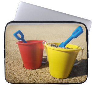 Shovels And Pails On Sandy Beach Laptop Sleeve