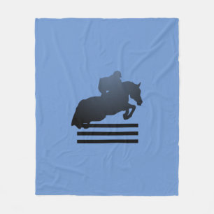  Show jumper clearing an obstacle.   Fleece Blanket