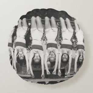Showgirls on monkey bars, playful design. round pillow