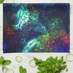 Showy scales on a dark blue to coloured background kitchen towel