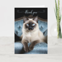 Siamese Cat on a Blue Chair