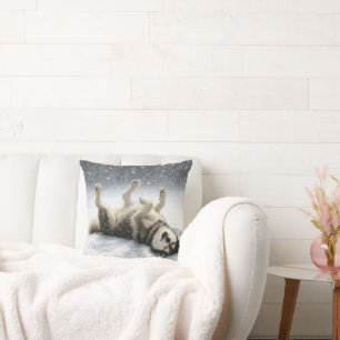 Siberian Huskey Creating a Snow Angel Throw Pillow