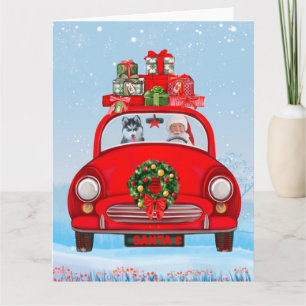 Siberian Husky Dog In Car With Santa Claus Card