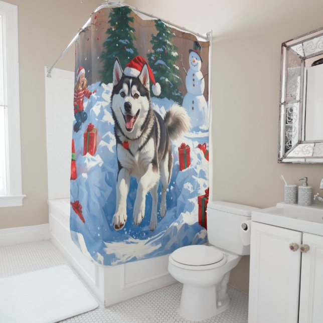 Siberian Husky Running in Snow with Christmas Hat (In Situ)