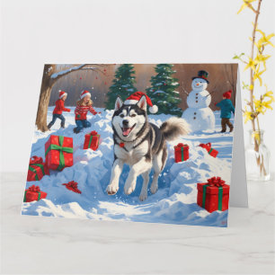 Siberian Husky Running in Snow with Christmas Hat Card