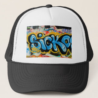 Sicko Graffiti on the Textured Wall Trucker Hat
