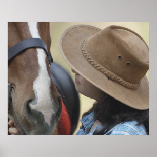 Side profile of a teenage girl touching a horse poster
