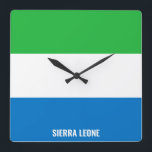 Sierra Leone Flag Dazzling Patriotic Square Wall Clock<br><div class="desc">Sierra Leone Flag Dazzling Patriotic Square Wall Clock in the colours and the elements of the Sierra Leone national flag covering the front of the clock. National flag colours are complemented with the text "Sierra Leone" on the bottom. Text is fully customizable using "Customize it!" feature. Feel free to change...</div>
